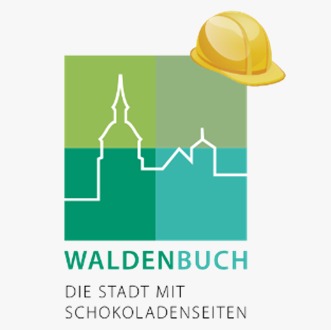 Hier ist das Logo von Waldenbuch mit einem gelben Helm